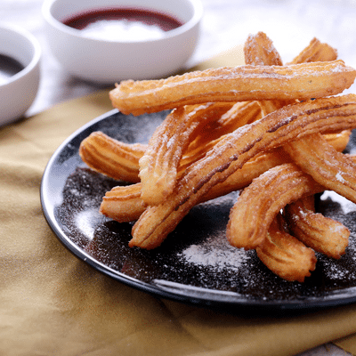 Photo of Churros and Chocolate in a Spanish Café